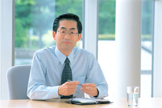 専務取締役 小川哲司